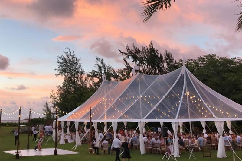 Party outside underneath a tent.