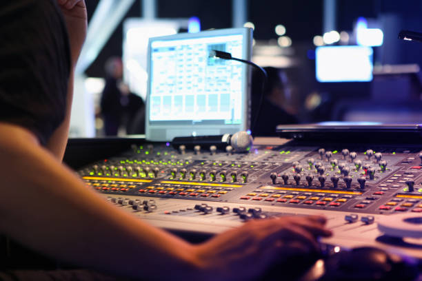 close ups on sound engineer with studio sound and visual mixer used for media and events directing and recording studios